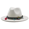 Close-up of white wool fedora featuring bohemian braided band and turquoise charms - White