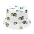 Detailed view of white bucket hat with yellow pineapple fruit patterns and cotton fabric - M / White Small Pineapple