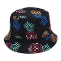 Close-up of colorful pineapple pattern on a black cotton bucket hat with fine stitching - M / Black Colorful Pineapple