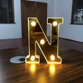 Decorative gold mirror letter N LED light with warm white bulbs for festive decoration - Letter N