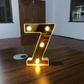 Number 7 LED decorative light in black finish with warm yellow bulbs for events - Number 7