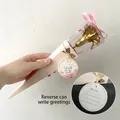 Golden foil rose in a pink gift box with a customizable message card for Valentine Day - Single Carnation with Triangle Box