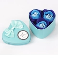 Light blue heart-shaped tin box with a satin bow and three blue-purple soap roses - 3 Pieces / Blue