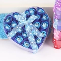 Detailed close-up of heart-shaped gift box with blue gradient soap roses and love ribbon - Blue Mix