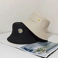 Detail of cotton canvas sun hat featuring daisy embroidery in black and beige colors - One Size / Khaki