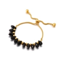 Bracciale minimalista in acciaio al titanio dorato con perline sfaccettate nere - Perle Navette Sfaccettate Nere Stile Oro (KB151900-Z)