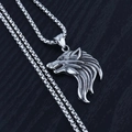 Macro shot of a highly detailed silver wolf head pendant on a sturdy stainless steel chain - Wolf Head + Steel Chain