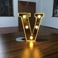 Golden LED letter V decorative lamp with warm lights for romantic birthday celebrations - Letter V