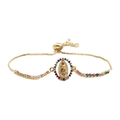Pulsera ajustable de oro Virgen María con circonitas de colores sobre fondo blanco - Cadena De Colores Mnls