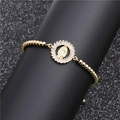 Pulsera dorada con circonitas y colgante de Nuestra Señora de Guadalupe en cuentas - Cadena de Bolas Dorada