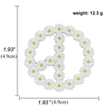 Detail of white daisy peace sign brooch with 1.93 inch size and 12.3g weight specs - A00674 Peace Daisy Wreath