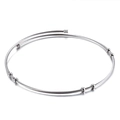 Silver twisted wire cable bangle bracelet with metallic beads on white background - Steel Color Choker (KN107091-Z)