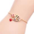 Adjustable gold evil eye bracelet with colorful zircons and red heart charm on wrist - Gold Box Chain Evil Eye