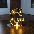Golden LED letter G light with warm glow and mirror finish for romantic party decoration - Letter G