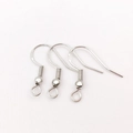 Detailed macro view of S925 sterling silver earring hooks for DIY jewelry making - White K Stamped 925 Ear Hook