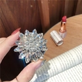 Close-up of a luxury crystal flower phone grip with shimmering rhinestones and black base - Gem Holder-No.6 Flower Long Diamond-White