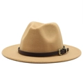 Macro shot of khaki wool fedora featuring dark brown leather band and gold snake buckle - Camel
