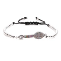 Adjustable silver beaded bracelet with micro-paved zircon evil eye charm on white backdrop - Bead Chain Platinum