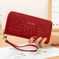 Red long zip-around quilted PU leather wallet with wristlet and stitching detail - Wave Jujube Red