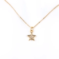 Detailed view of a gold plated brass star pendant necklace with micro-pave zircons - Gold Star Necklace / Gold