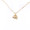 Detailed close-up of a golden elephant pendant with micro-inlaid clear zircon stones - Gold Elephant Necklace