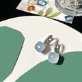 Macro shot of light blue square crystal earrings with pavé-set zircon hoops - Light Blue Jade