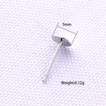 Macro detail of 5mm S925 sterling silver flat pad earring posts for DIY jewelry making - 5mm