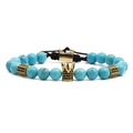 Blue turquoise bead bracelet with a gold crown charm on adjustable black cord - Woven Style / Blue Turquoise