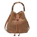Handcrafted straw bucket bag with bamboo handles and adjustable shoulder strap for summer - Brown