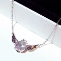 Elegant silver angel wing necklace with a dancing center zircon on a display box - Dancing Stone Silver Color / White Gold