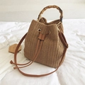 Brown straw bucket bag with bamboo handle and leather drawstring for summer vacation - Brown