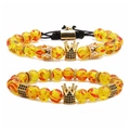 Ensemble de deux bracelets perlés avec couronne dorée et perles jaunes à motifs de feu - Ensemble Style Ambre