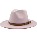 Close-up detail of a pink woolen fedora hat with a brown leather belt buckle band. - Pink