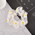 Detail shot of white mesh scrunchie with yellow daisy floral prints on grey background - Mesh Style / Beige Daisy Mesh Scrunchie