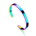 Macro side view of a polished rainbow titanium steel C-shaped open cuff bracelet - 6mm / Rainbow