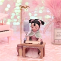Ancient Chinese Dunhuang flying girl figurine playing guqin lute in resin pink dress - Playing Instrument Under Light