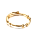 Golden titanium steel braided wire bangle with small round beads and open cuff design - Gold Color Bracelet
