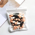 Dual-sided disposable eyeshadow sponge brushes with orange and white tips in bulk bag - 6.5cm Black Handle Skin White Sponge - 50 Pcs Poly Bag