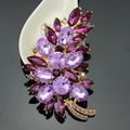 Elegant purple crystal flower brooch in gold plating with a cluster of faceted gemstones - 18K Gold with Purple Zirconia