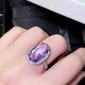 Elegant oval purple amethyst halo ring with micro-pawned cubic zirconia on silver band - US 6 / Purple