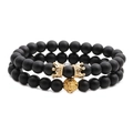 Matte black stone beads bracelet set with golden lion head and crown charms for men - 2Pcs Set (Crown & Lion Head)