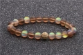 Bracelet de perles pierre de lune 8mm avec breloque en zircone dorée sur noir - Marron