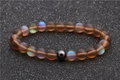 Brown moonstone and hematite beaded bracelet with matte finish on starry background - Brown Moonstone Hematite