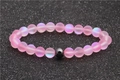 Bracelet fait main en pierre de lune 8mm et hématite avec perles roses mates sur fond noir - Rose