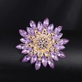 Elegant gold-tone flower brooch featuring purple marquise crystals and clear center rhinestones - XD017-8 Purple