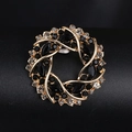 Elegant round acrylic brooch with golden metal base and black rhinestone inlay - BR2393-3 Black