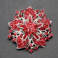 Luxurious silver flower brooch with deep red crystals in a radiant snowflake design - Red