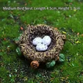 Miniature resin bird nest with white eggs on green grass for garden decoration - Medium Bird Nest
