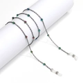 Colorful beaded sunglass chain with non-slip silicone loops on a white display stand - Multicolor Aurora Beaded Style