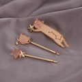 Three-piece gold cat and star hair clip set with pink resin detail on purple satin - Pink Cat with Cat Head Star